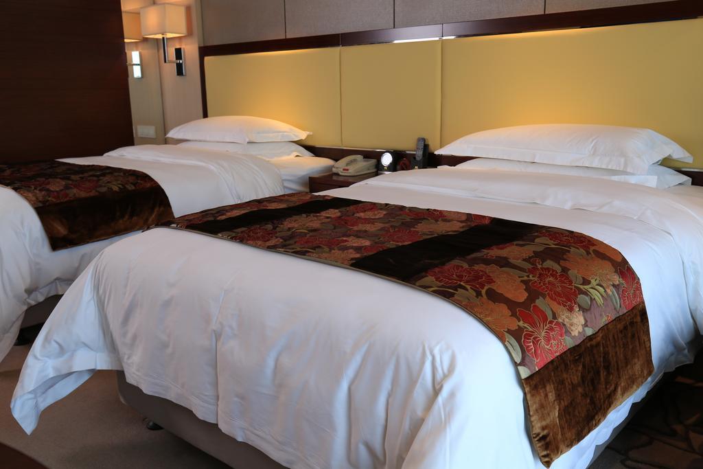 Guangzhou Changfeng Gloria Plaza Hotel Zimmer foto